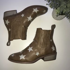 Boutique booties with silver star detailing!